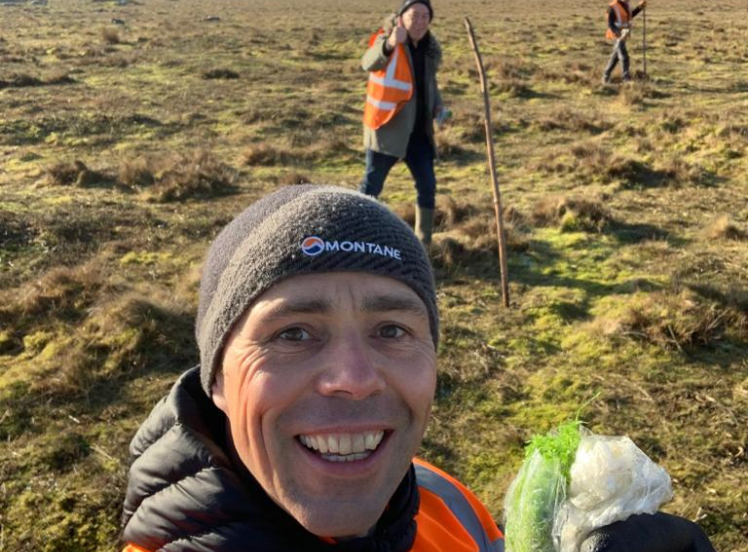 Andy and Tony volunteering planting Sphagnum Moss